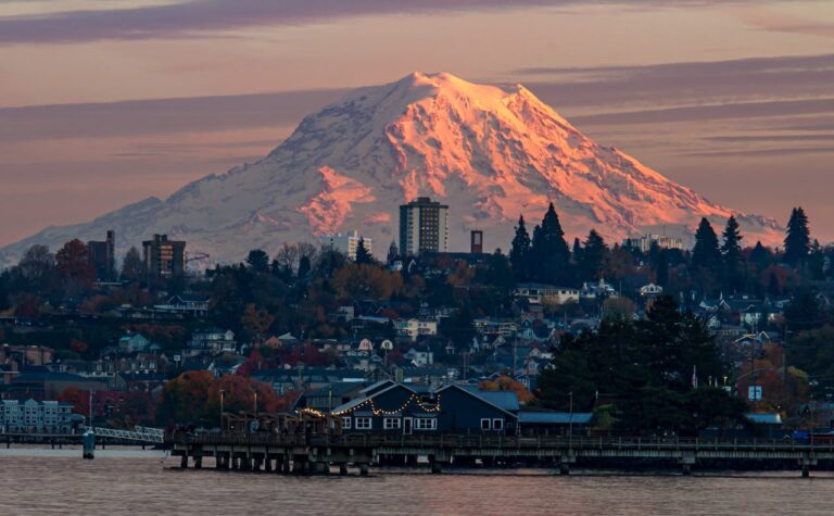 Snow capped mountain over town in WA.